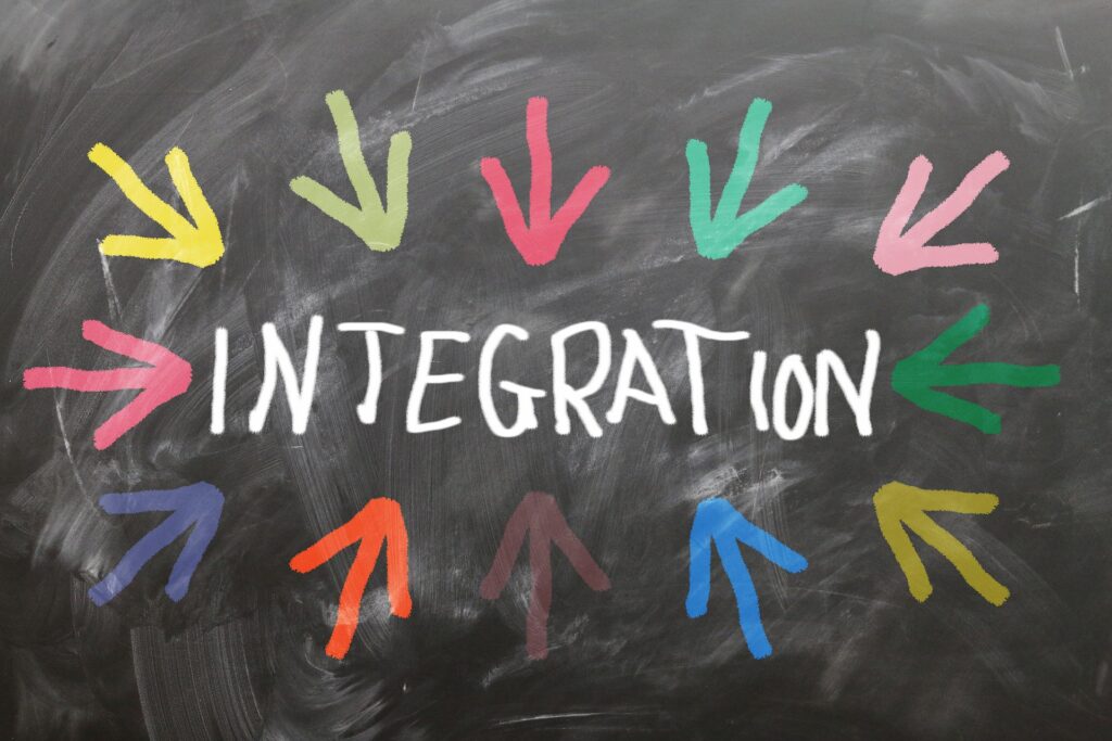 Illustration of interconnected puzzle pieces representing application integration, symbolizing seamless connection between software systems for improved efficiency and productivity.